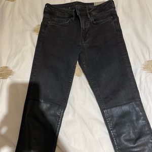 All saint’s black jeans with leather on the knee part.
